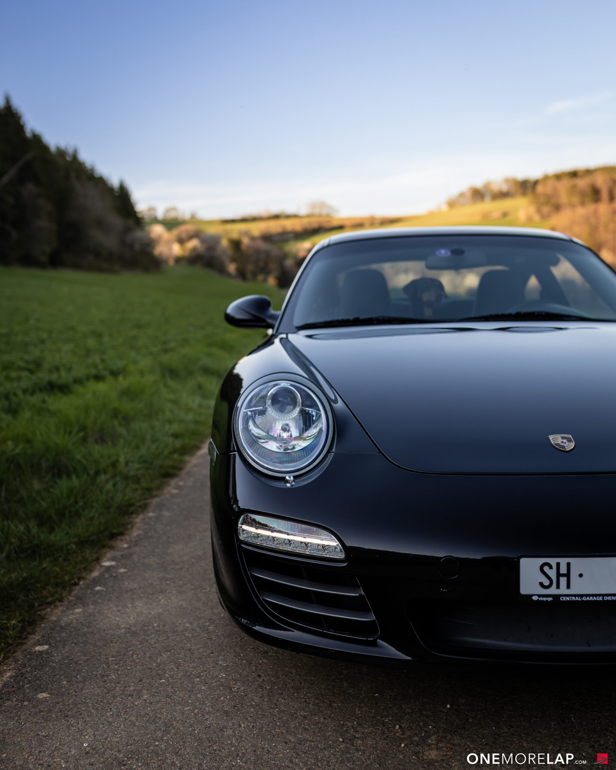 Porsche 997.2 Carrera 4S front, round headlights and Porsche crest